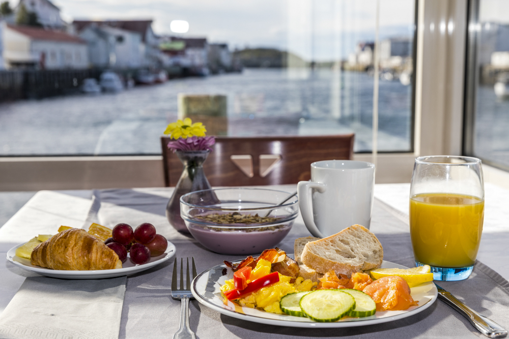 Enjoy breakfast with a lovely view of the fishing village